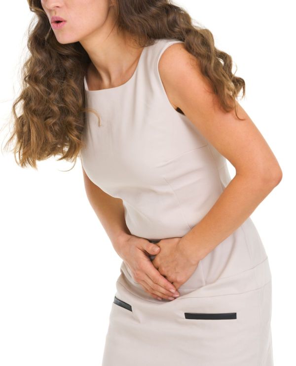 Closeup on woman having stomach pain