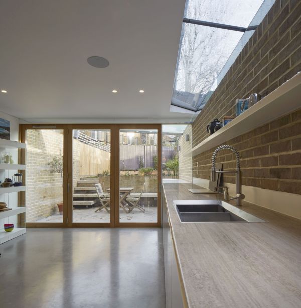 Kitchen with clerestory and courtyard view. London Brownstones, London, United Kingdom. Architect: Knox Bhavan Architects LLP, 2014., Image: 263311729, License: Rights-managed, Restrictions: , Model Release: no, Credit line: Profimedia, Corbis