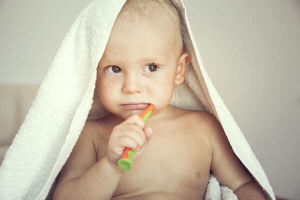 child, kid, baby, crumb, boy, teeth, toothbrush, morning, cleanliness, hygiene, towel, bath, childhood, habit, health, study, toothpaste, "after shower", shower, clean, portrait, blond, room, person, "brush teeth", healthy, mouth, hand, hands, dentist, happy, beautiful, water, drop, healthy, "baby teeth", "first teeth", wash, young, healthy, lifestyle,