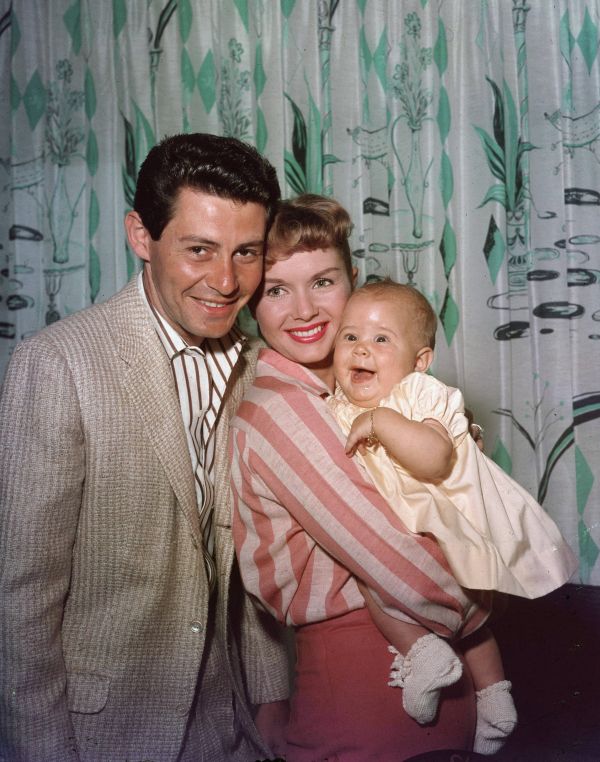 Eddie Fisher and Debbie Reynolds with their daughter Carrie Fisher, circa 1957.
